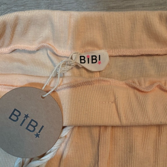 BiBi Peach Ruffle Romper - Picture 9 of 9